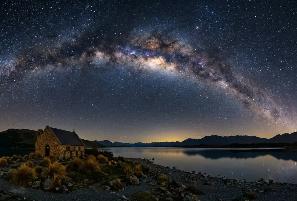 Milky Way galactic core arching directly overhead above Lake Tekapo, illustrating why Aoraki Mackenzie is worth it for stargazing, Gold Tier dark sky reserve, New Zealand